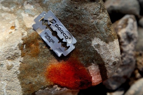 Razor blade and stone used as a traditional circumcision tool in Ahmedela, Ahmedela, Ethiopia