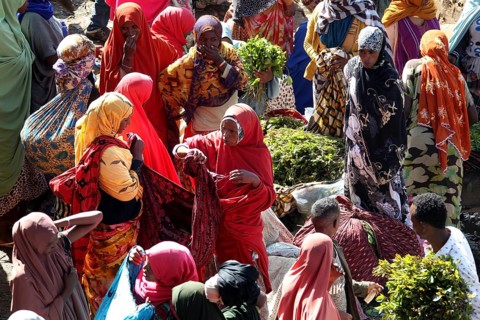 Colored headscarves and clothing dominate the khat market, Awaday, Ethiopia