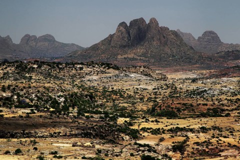 Wide landscape surrounded by the impressive Adua mountain range, Adua, Tigray, Ethiopia