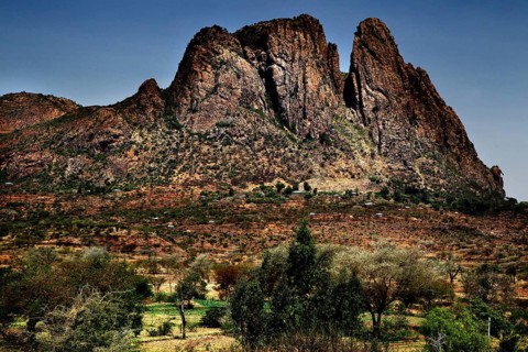 Impressive mountain range with sparse vegetation and clear skies, Adua, Tigray, Ethiopia