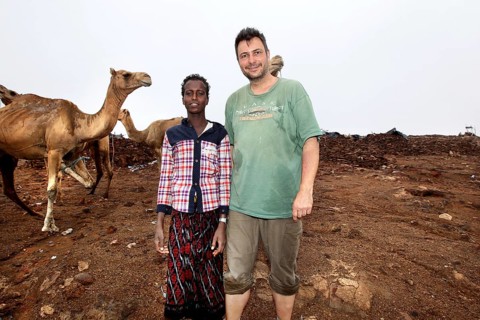 A camel driver with Roland's company and camels at Erta Ale Camp, Erta Ale, Ethiopia