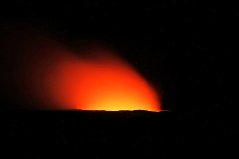 Fiery glow over the crater of a volcano at night, Erta Ale, Ethiopia