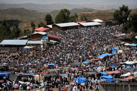 Bustling market in Lalibela full of people and colorful stalls, Lalibela, Ethiopia