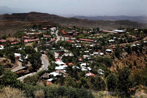 Panoramic view of the city of Lalibela nestled in the hilly landscape, Lalibela, Amhara, Ethiopia