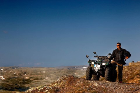 Adventurous ATV ride through the vast, barren mountains of Aurlandsfjell, Aurlandsfjell, Norway