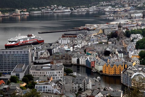 Panoramic view of Ålesund's old town with a Hurtigruten ship in the harbor, Ålesund, Norway