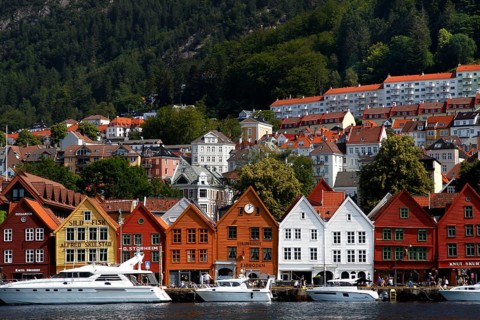 House facades of the Hanseatic Quarter with boats in the foreground, Bergen, Norway