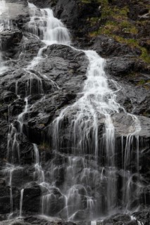 Summer day visiting Espelandsfossen falls near Bergen, scenic nature and flowing water, Vestland,