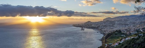 Sunset over the Atlantic Ocean, harbour with cruise ships, Funchal, Madeira, Portugal