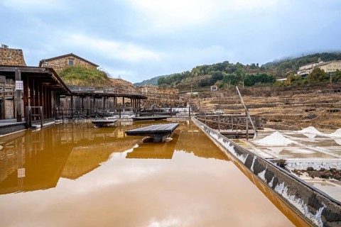 Terraced salt evaporation ponds creating a unique landscape in the historic salt valley of anana,