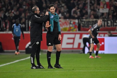 Fourth Official Referee Referee Referee Patrick Alt addresses microphone from referee Referee Dr.