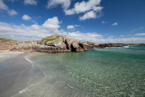 Turquoise sea with rocky bays and fine white sand. Summer, Ogna, Rogaland, Norway
