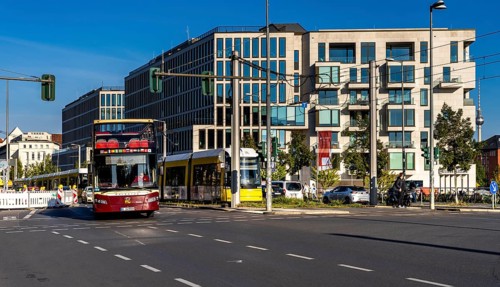 Berlin road traffic with buses, trams and pedestrians at and around the main train station, Berlin,
