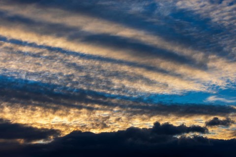 Dramatic cloudy sky, cirrus clouds at sunset, plume clouds, Austria