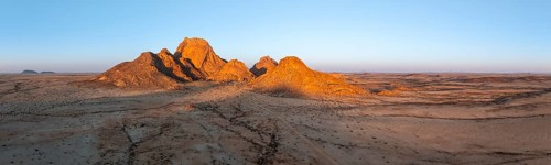 Aerial view, sunset, mountains in the desert, Spitzkoppe summit, Namib desert, Namibia