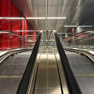 Artwork titled Three Model Spaces by Ralf Brög, escalators at Heinrich-Heine-Allee subway station,
