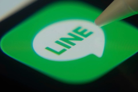 Dhaka, Bangladesh- 06 Dec 2025: Close-up of the LINE app on a screen with a stylus pointing at it