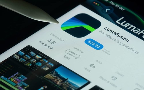 Dhaka, Bangladesh- 30 Oct 2025: LumaFusion app on a iPad screen with a pen pointing at the install