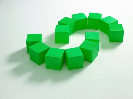 12 green wooden cubes against a white background