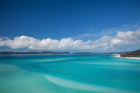 Sunny daytime view from Hill Inlet lookout over Whitehaven Beach, Whitsunday Island, Queensland,