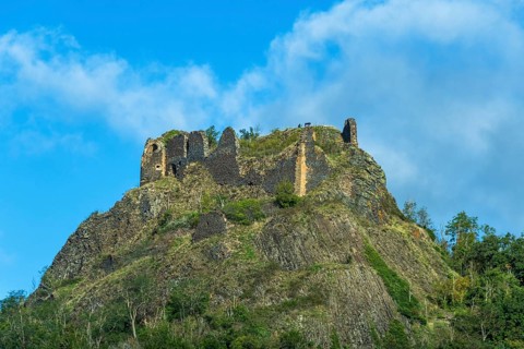 Buron village and his castle. Puy de Dome. Auvergne Rhone Alpes. France