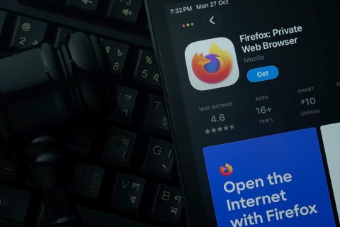 Dhaka, Bangladesh- 28 Oct 2025: An iPad displaying the Firefox app against a judge's gavel and dark