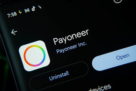 Dhaka, Bangladesh- 27 July 2025: Screen displaying Payoneer app with open and uninstall options,