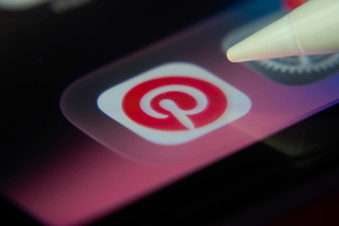 16 Nov 2025- Dhaka, Bangladesh: Stylus touching the Pinterest app icon on a smartphone screen