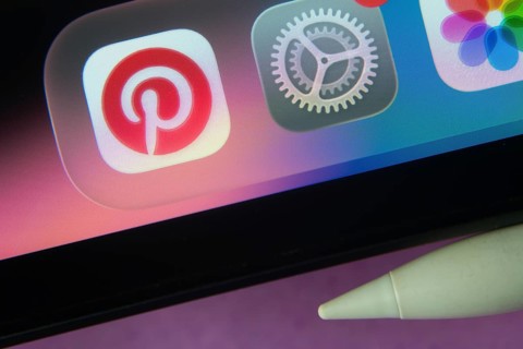 16 Nov 2025- Dhaka, Bangladesh: Pinterest and other app icons with a digital pen on a iPad screen