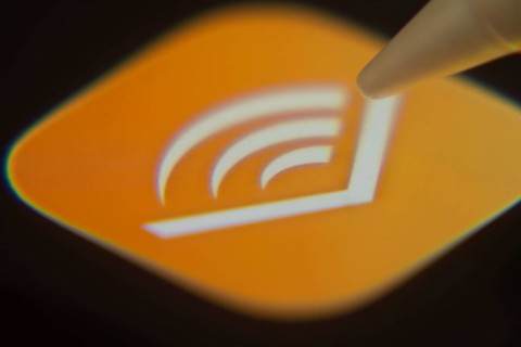 Dhaka, Bangladesh- 06 Dec 2025: Close-up of the Audible app on a screen with a stylus pointing at