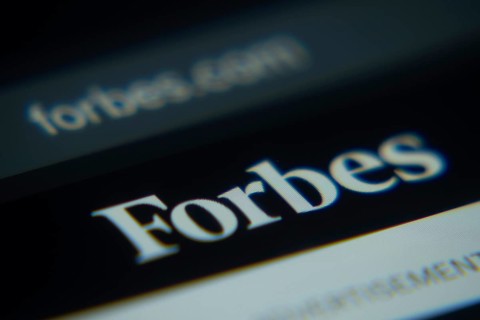 Dhaka, Bangladesh- 02 Dec 2025: A Close-up of a laptop screen is displaying the Forbes web