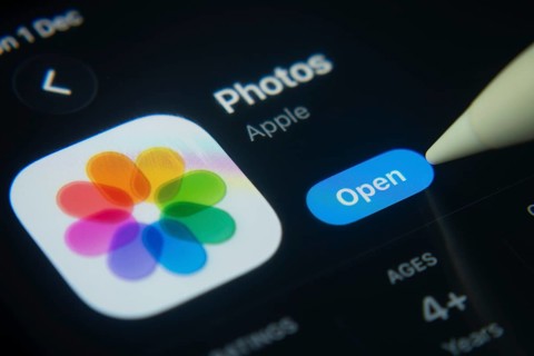 Dhaka, Bangladesh- 01 Dec 2025: A close-up of the Apple Photos app icon in the App Store on an iPad