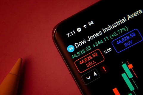 Dhaka, Bangladesh- 08 Sep 2025: Close-up of a phone screen showing Dow Jones Industrial Average