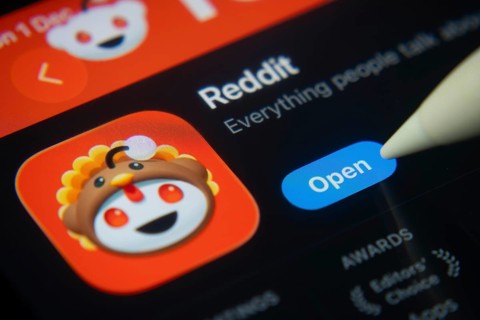 Dhaka, Bangladesh- 01 Dec 2025: A close-up of the Reddit app icon in the App Store on an iPad