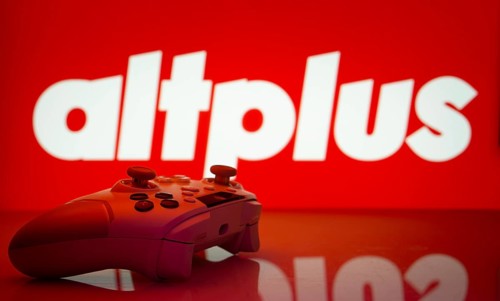 Dhaka, Bangladesh- 20 Mar 2025: A close-up of a white gamepad with the AltPlus Inc seen on screen