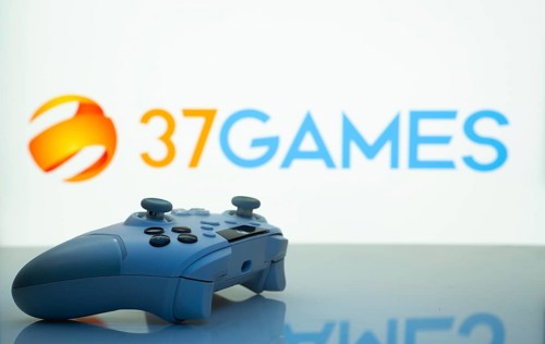 Dhaka, Bangladesh- 20 Mar 2025: A close-up of a white gamepad with the 37Games seen on screen in