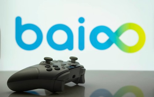 Dhaka, Bangladesh- 20 Mar 2025: A close-up of a white gamepad with the Baioo Family Interactive Ltd