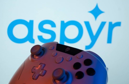 Dhaka, Bangladesh- 20 Mar 2025: A close-up of a gamepad with the Aspyr seen on screen in the