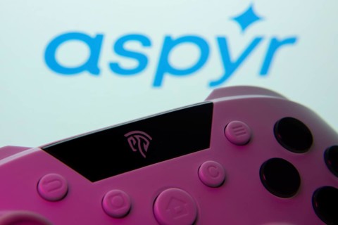 Dhaka, Bangladesh- 24 Mar 2025: A close-up of a gamepad with the Aspyr seen on screen in the