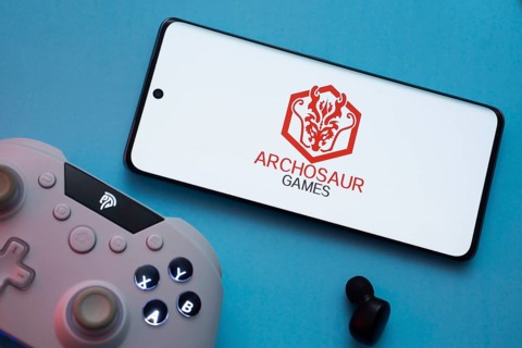 Dhaka, Bangladesh- 22 March 2025: Archosaur Games logo displayed on a smartphone surrounded by