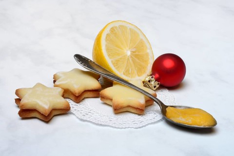 Lemon cookies, lemon and spoon with lemon curd