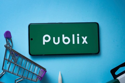 Dhaka, Bangladesh- 03 July 2025: Smartphone displaying Publix logo with shopping cart on a blue