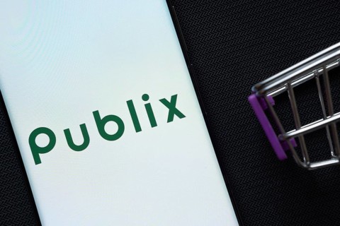 Dhaka, Bangladesh- 03 July 2025: A smartphone displaying the Publix logo next to a miniature