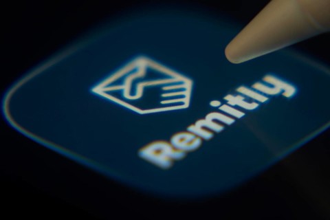 Dhaka, Bangladesh- 06 Dec 2025: Close-up of the Remitly app on a screen with a stylus pointing at
