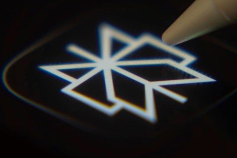 Dhaka, Bangladesh- 06 Dec 2025: Close-up of the Perplexity app on a screen with a stylus pointing