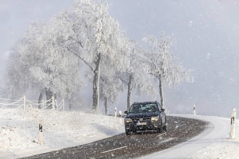 Winter in the Swabian Jura. Country road with snowy landscape near Westerheim, Alb-Donau-Kreis,