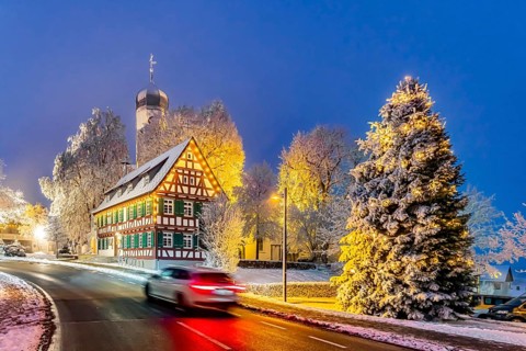 St. Stephen's Church Westerheim in winter with Christmas tree. hoarfrost. Westerheim, Alb-Danube