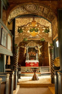 Interior with a view of the altar in Lom Stave Church (Lom stavkyrkje), Lom, Norway