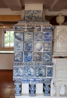 Faience tiled stove or Kachelofen from Northern Germany, ca. 1800, Keramik.um museum, an exhibition