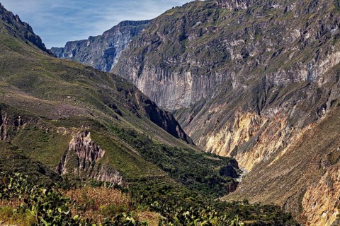 Deep gorge with dramatic cliffs and sparse vegetation, The landscape of Colca Canyon in the Aden of